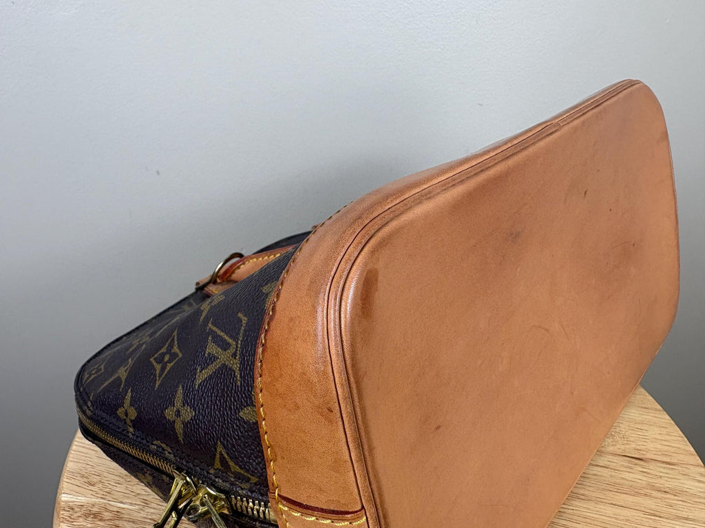 Authentic Louis Vuitton Alma Monogram Handbag
