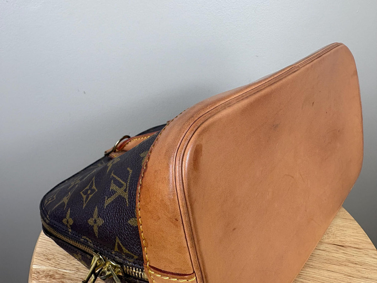 Authentic Louis Vuitton Alma Monogram Handbag