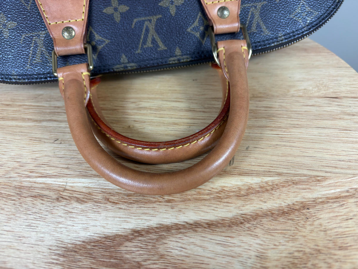 Authentic Louis Vuitton Alma Monogram Handbag