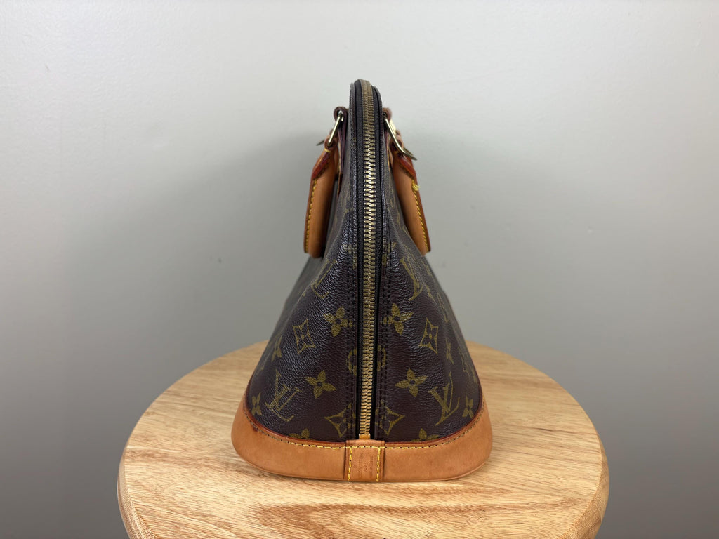 Authentic Louis Vuitton Alma Monogram Handbag