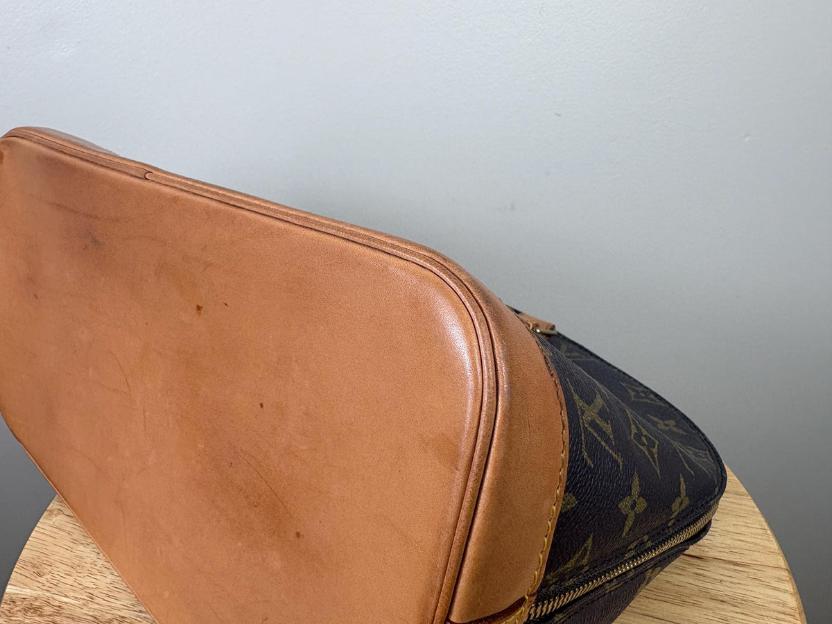 Authentic Louis Vuitton Alma Monogram Handbag
