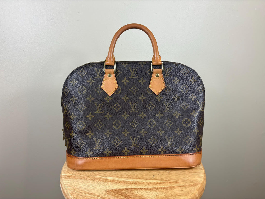 Authentic Louis Vuitton Alma Monogram Handbag