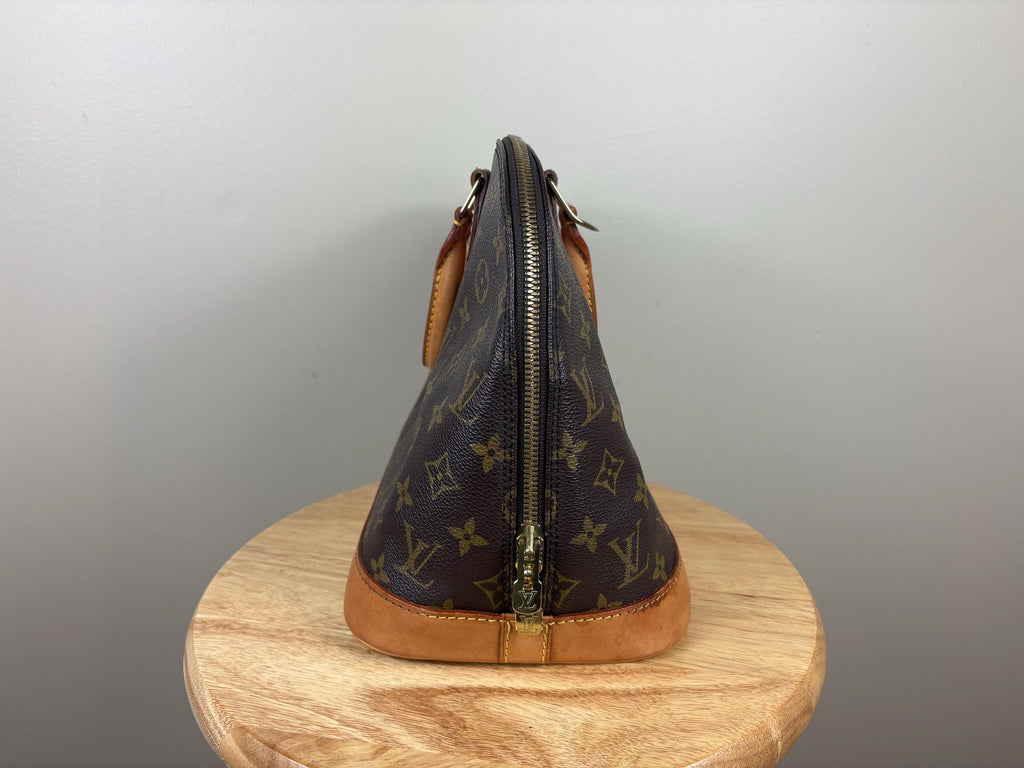 Authentic Louis Vuitton Alma Monogram Handbag